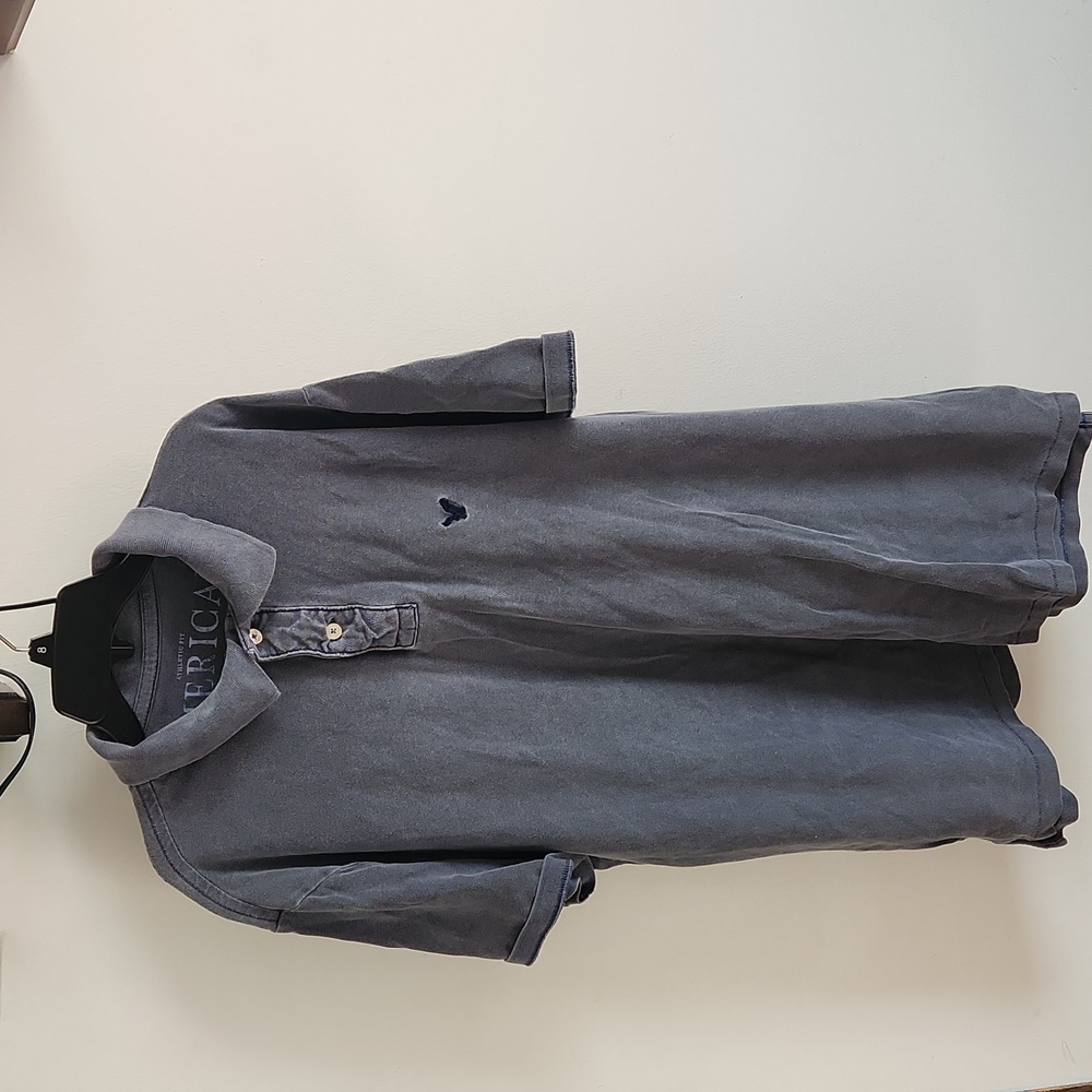 Man's short sleeve half button shirt